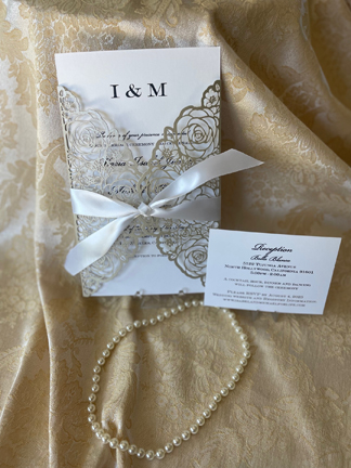 When to send out a Laser Cut, Gold color Wedding Invitation on Gold colored background.