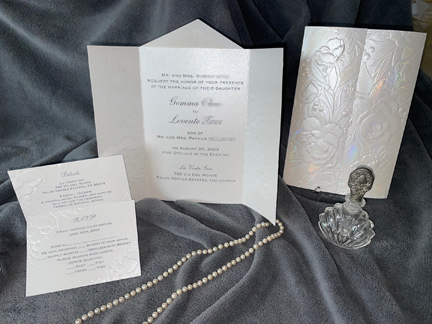 When to send out a Wedding Invitation with Details Card and RSVP Card on Gray background.